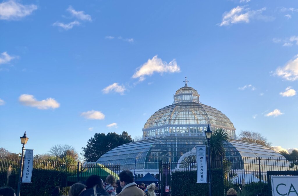 Sefton Park Palm House on a sunny day, demonstrating the kind of walk 'that girl' may go on 