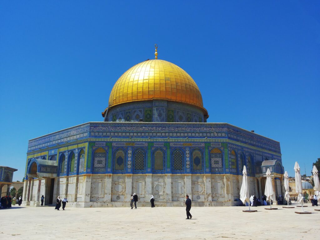 Al-Aqsa mosque in Jerusalem on a sunny day. people against apartheid is the message spread by IAW.
